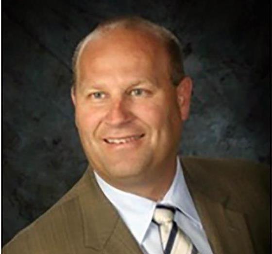 Coach Kelly Graves Draws Laughter, Applause at Business Forum